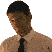 a man in a white shirt and black tie is making a face