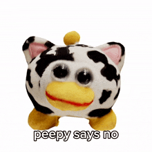 a stuffed cow with a yellow beak and the words peepy says no