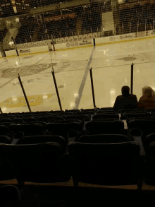 a hockey rink with a sign that says ' reebok '
