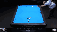 a pool table with a blue cloth that says diamond