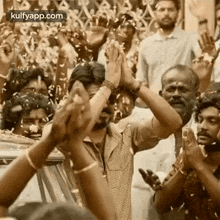 praising walking in style joining hands smiling face actor vijay