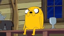 a cartoon character is sitting on a wooden ledge