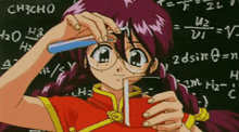 a girl with glasses is holding a test tube in front of a blackboard that says ch3cho