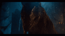 a close up of a monster in the dark