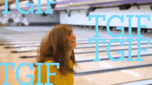 a woman is smiling in a bowling alley and the words tgif are visible
