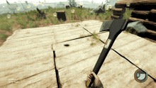a person is holding a large axe in a video game with a screen that says gather items