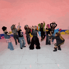 a group of people are dancing with one wearing a shirt with the number 23 on the front