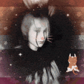 a blurry picture of a person with a cat behind them