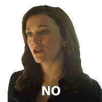 a woman in a black shirt says no on her chest