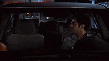 a man in a car is talking to another man who says hey nick sorry i thought you were jane lynch