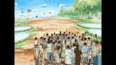 a group of people standing on a dirt road holding sticks .