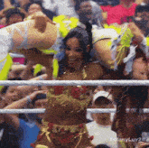 a woman in a wrestling ring with tiffanyluv24 written on the bottom right