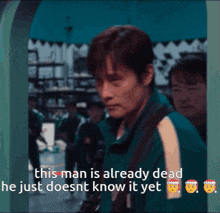 a man in a green jacket is talking about a man who is already dead