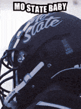 a mo state football helmet with the words mo state baby above it