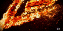 a picture of a fire with hk written on the bottom