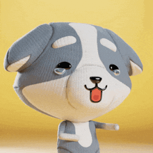 a gray and white stuffed animal with a red tongue