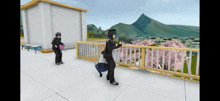 a couple of people are standing on a balcony with a mountain in the background