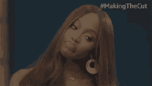 a woman is making a funny face with #makingthecut written on the bottom