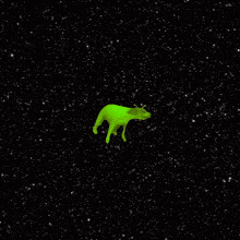 a green alien is floating in the space