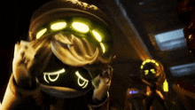 a cartoon character with a hat and glasses is standing in the dark .
