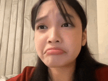 a close up of a woman making a funny face with her mouth open