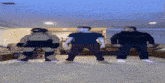 a group of people are dancing in a living room with a robot in the background