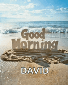 a beach scene with the words " good morning david " in the sand