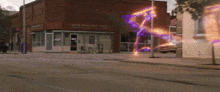 a united states post office building with a purple light coming out of it