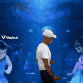 a man is dancing in front of a screen that says viggle.ai on it