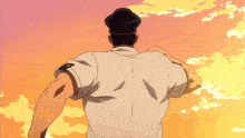 a man in a white shirt and black hat stands in front of a sunset sky