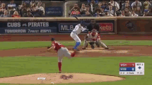 a baseball game between the cubs and pirates