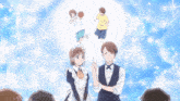 a man and a maid are standing next to each other in front of a blue background with stars
