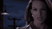 a woman 's face is behind the words sexbo