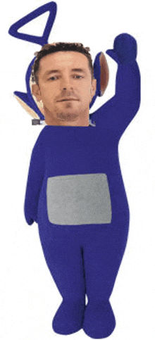 a man is wearing a blue teletubbies costume