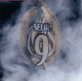 a medal with the number 9 and the word selir on it