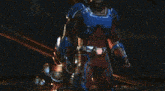 a superhero with an atom on his helmet is holding a bunch of lights