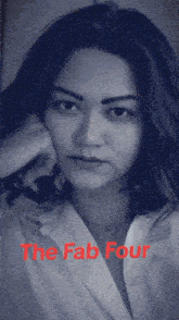 a poster for the fab four features two women