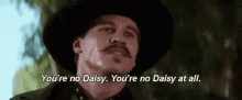 Youre No Daisy At All Doc Holliday GIF - Youre No Daisy At All Doc Holliday Dennis Quaid GIFs