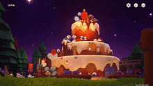 a video game screen shows a cake with a candle on top of it