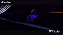 a purple background with the words awaken written on it