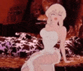 a cartoon of a woman in a white dress sitting on a couch .