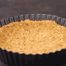 a pie crust in a pan that is ready to be cooked