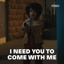 a woman is holding a gun and saying i need you to come with me