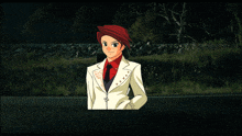 a man and a woman are standing next to each other and holding hands