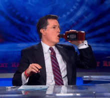 Stephen Colbert Drink GIF - Stephen Colbert Drink Drinking GIFs