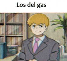 a picture of a man in a suit and tie with the words los del gas below him