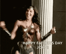 a woman dressed as wonder woman is dancing in front of a pillar .