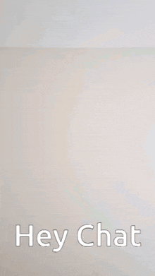 a blurry picture of a person with the words `` hey chat '' on it .