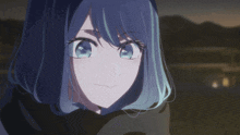 a girl with blue hair is smiling with her eyes closed and her mouth open