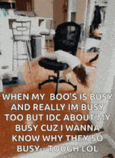 a dog is laying on top of a chair in a room .